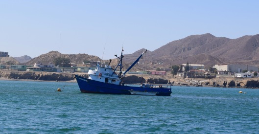 We were anchored next to this fishing boat in Turtle Bay.  On our way down with the Baja Ha Ha, Greg, Richard, Gary and I hiked up the mountain range you see on the right.  Going up was easy, coming down not so much.